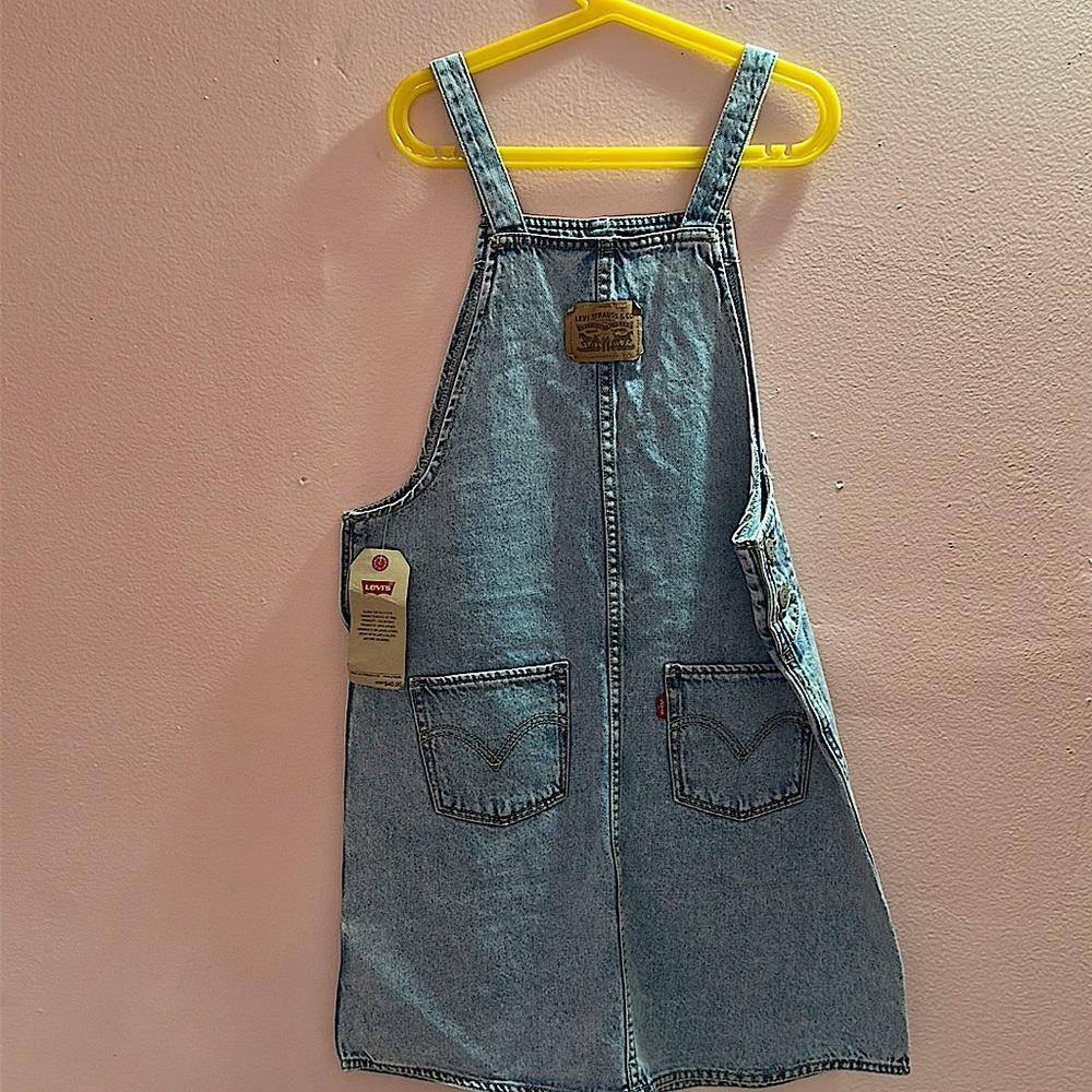 beautiful overall skirt never been used with its original tag.